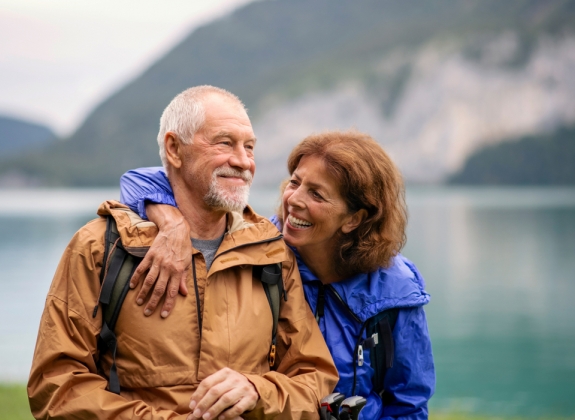 happy couple exploring national park