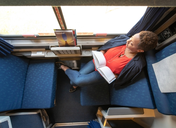 woman reading in an Amtrak Roomette