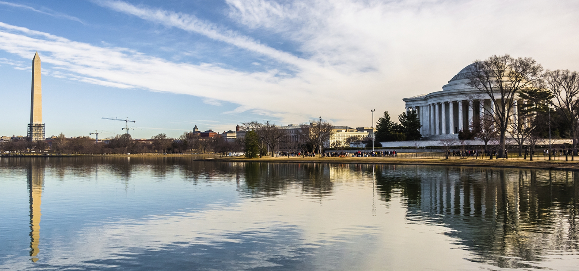 The Washington Monument and Thomas Jefferson Memorial reflecting Washington, DC Rail Vacations