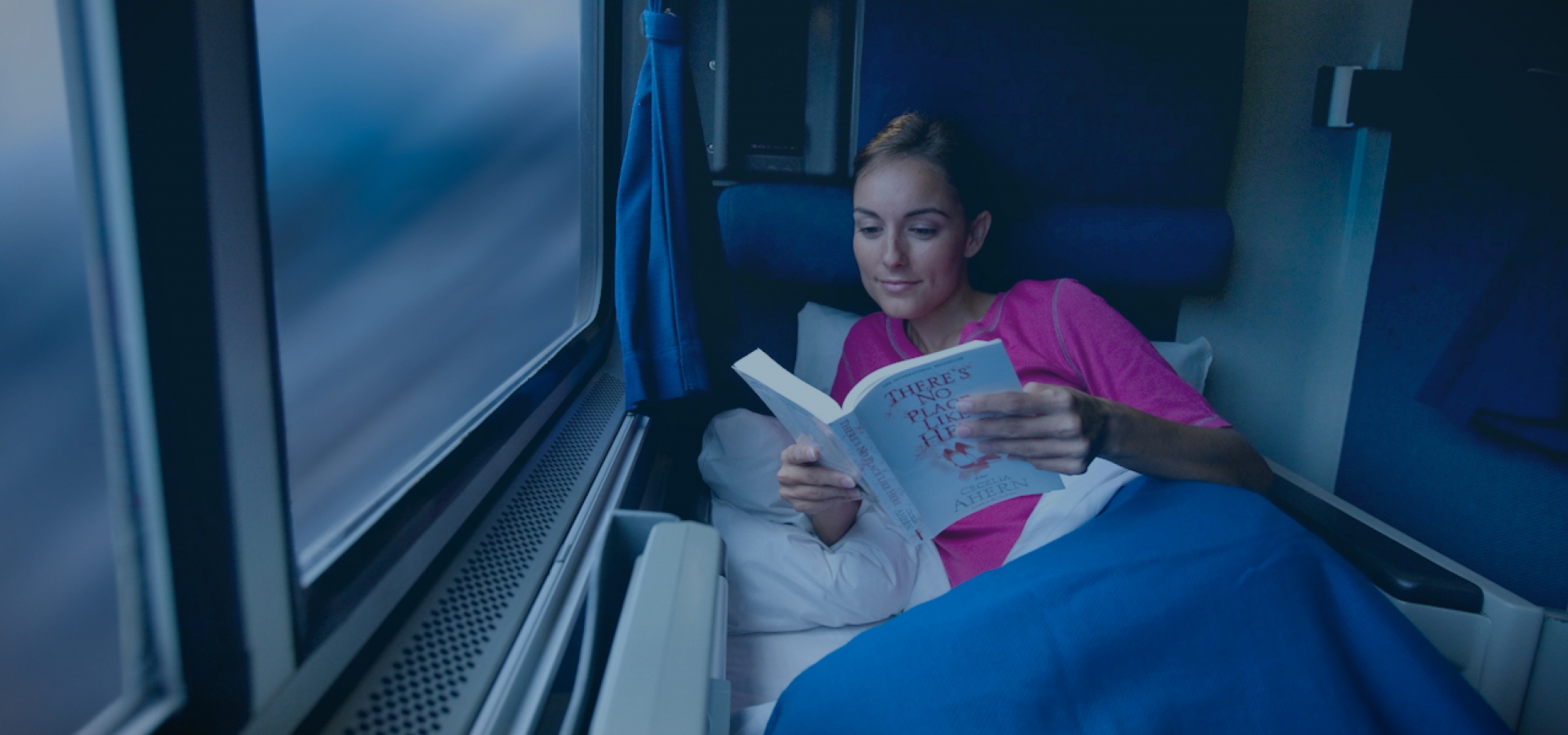woman in roomette onboard amtrak