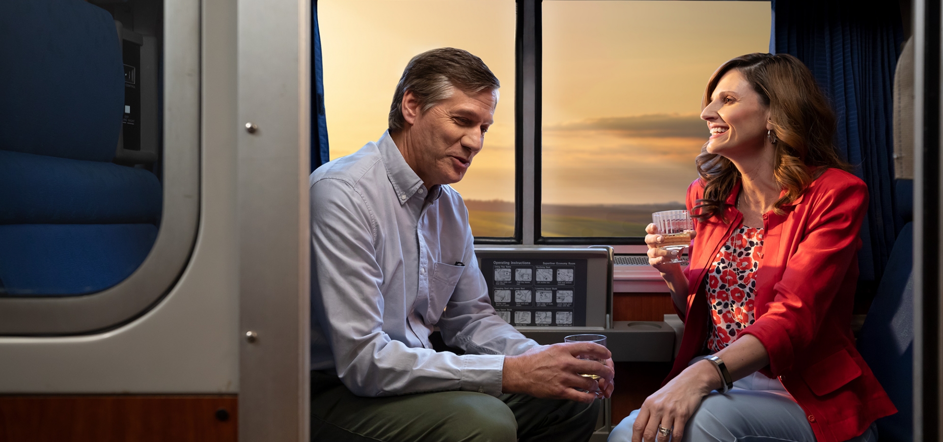 a couple in a private sleeping room onboard amtrak