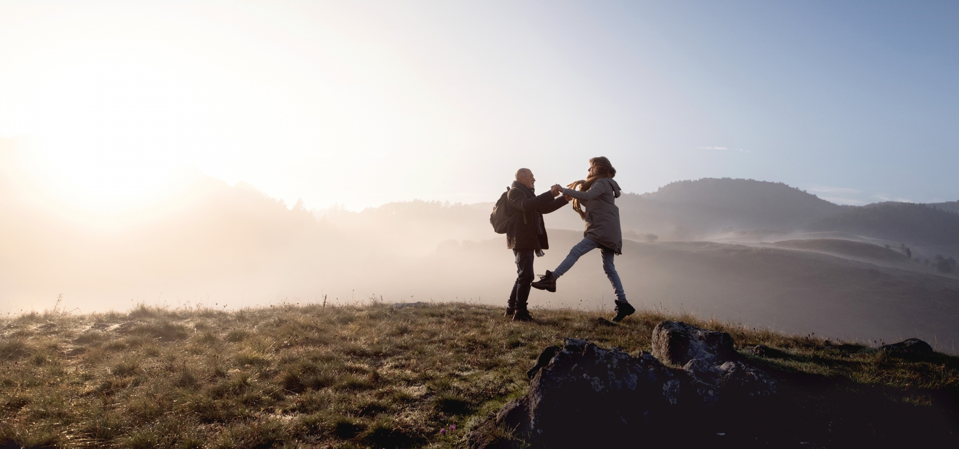 man and woman playing while exploring