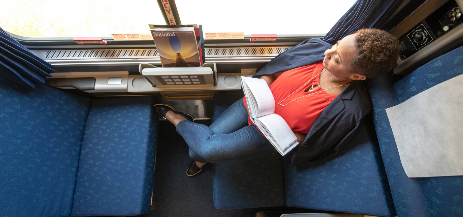 woman reading in an Amtrak Roomette