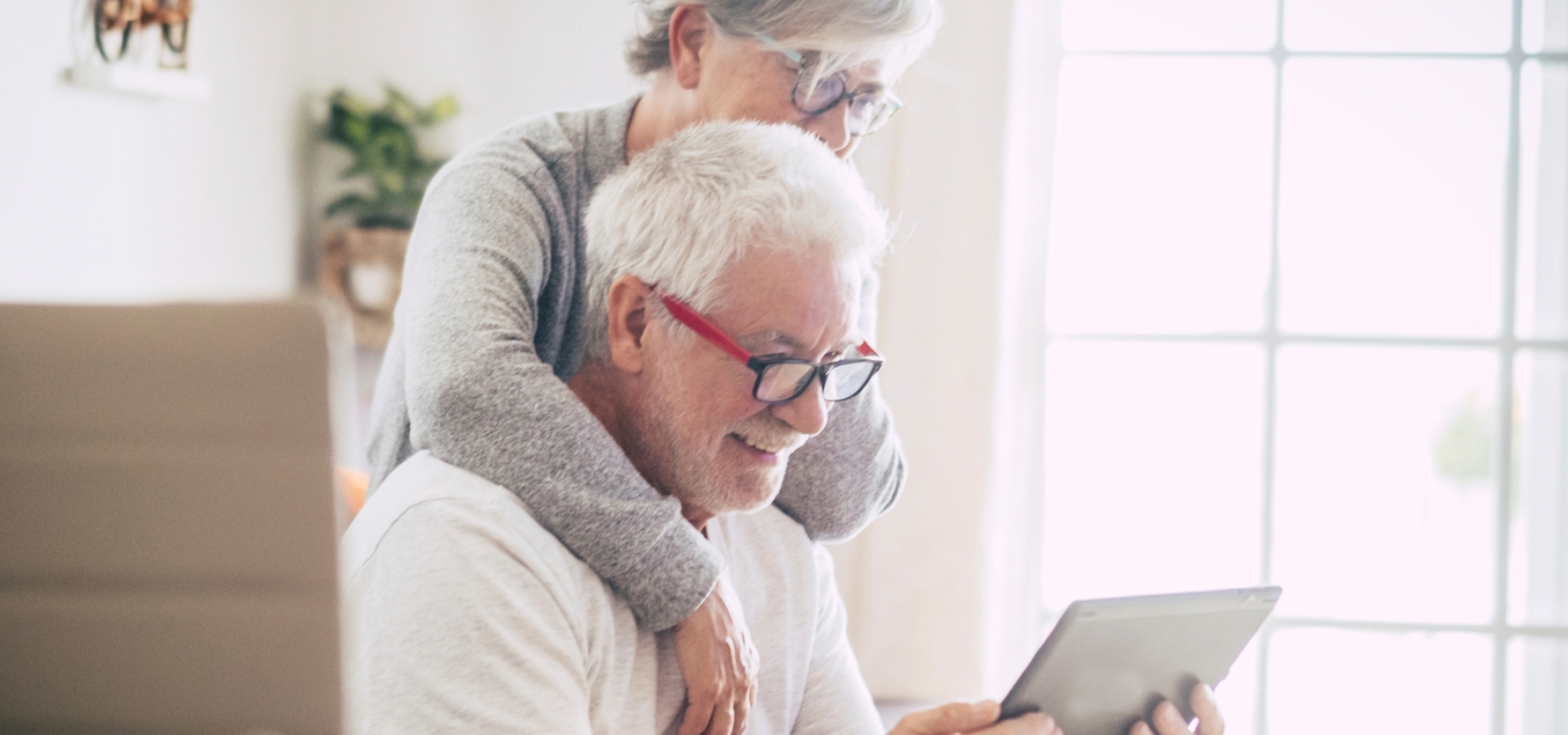 What does it cost retired couple looking at an ipad