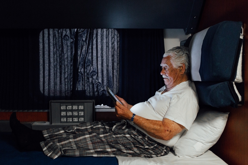 Superliner Bedroom on Amtrak - Senior Man Resting